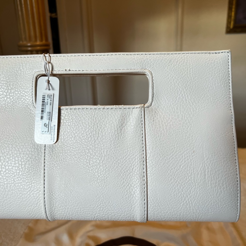 White clutch brand belle de jour/ charming Charlie, originally 19 selling for 10